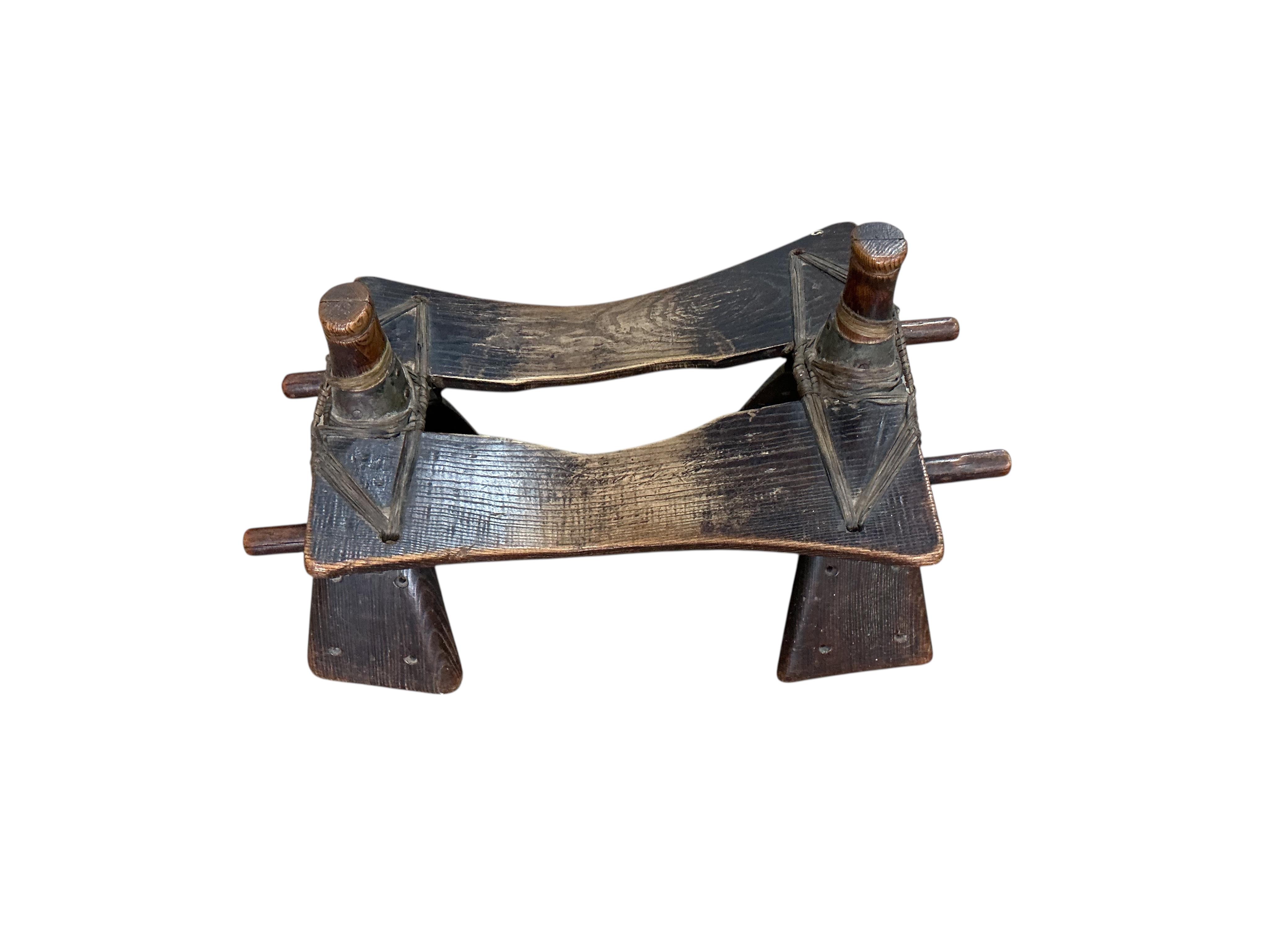 A camel's saddle, width 78cm, depth 49cm, height 46cm